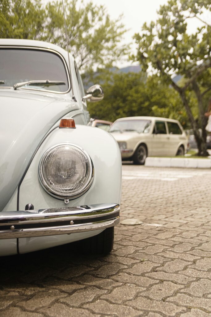 Vintage Volkswagen Beetle parked outdoors in Rio de Janeiro.